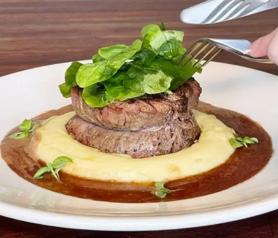Angus tenderloin over mashed potatoes