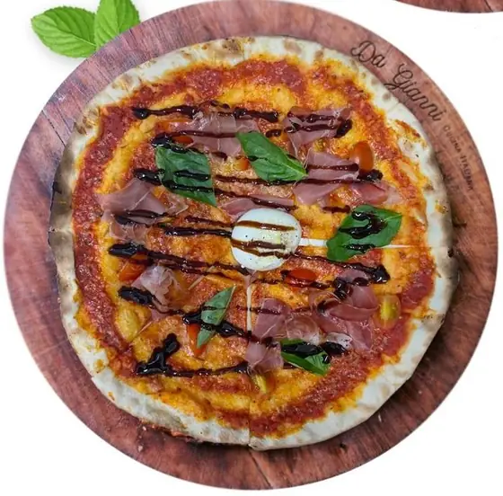 Thin Romana pizza with prosciutto and burrata